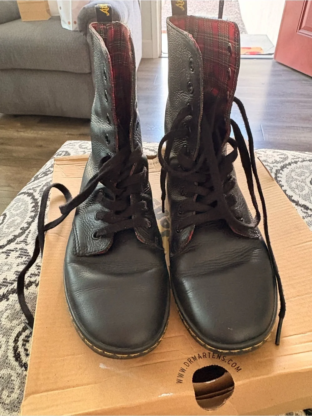 Dr. Martens Black Leather Lace-Up Boots with Red Plaid Lining - Picture 1 of 7